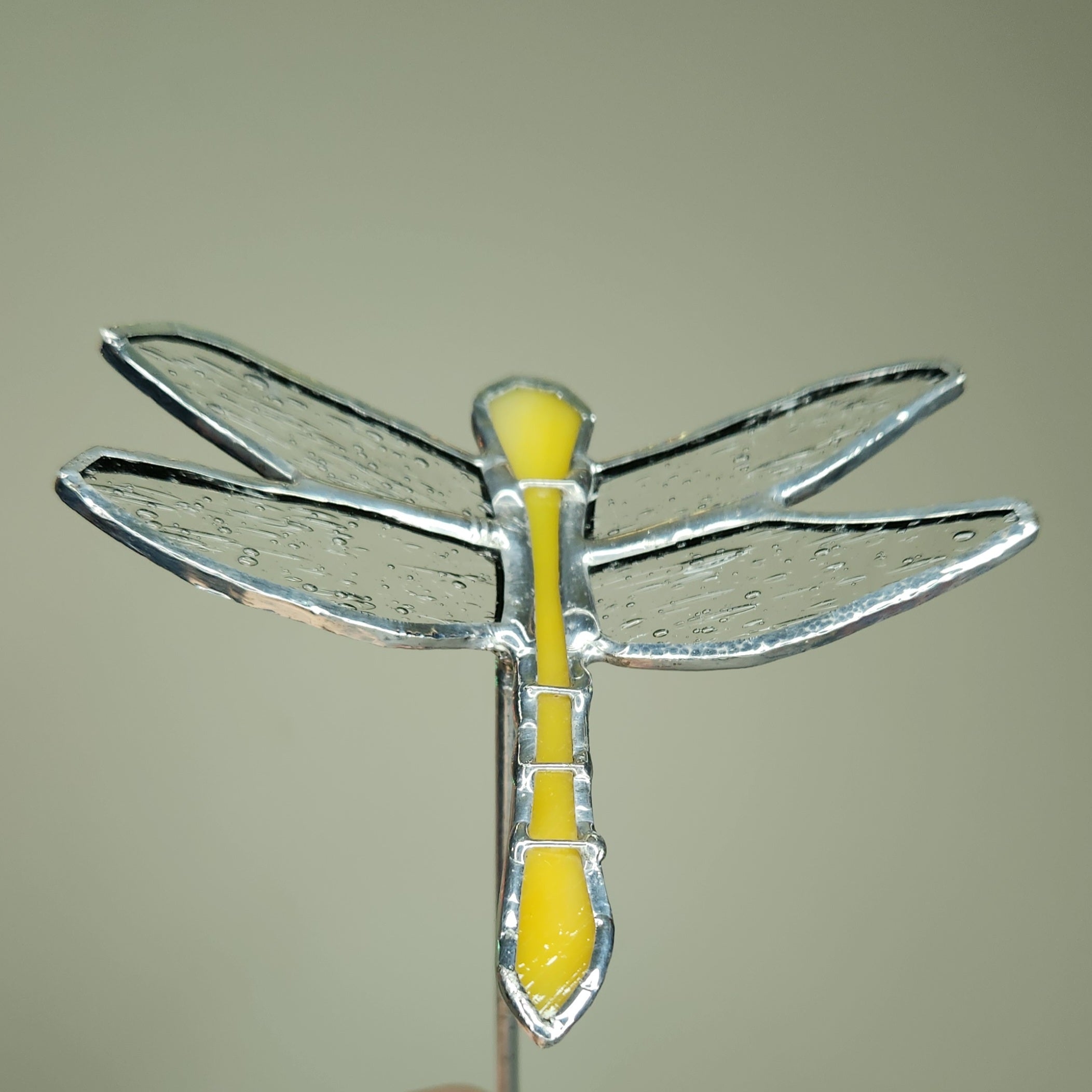 Dragonfly Plant Stake - Sugar & Spice. Yellow-orange dragonfly backside with wire detail